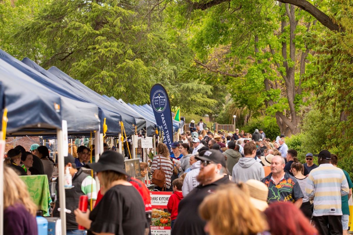 Crowd of people at street food stalls in Botanic Gardens