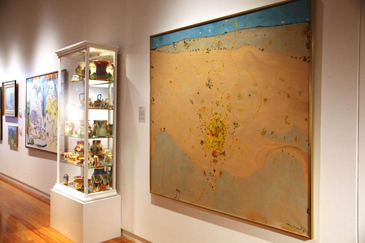 A painting on the wall of an art gallery.