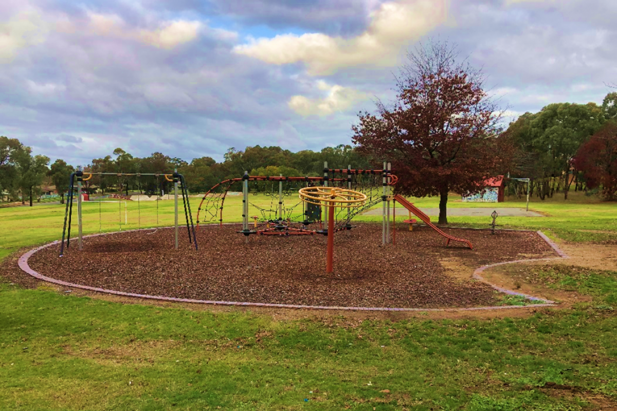 A children's out playground before shade sails were installed. 