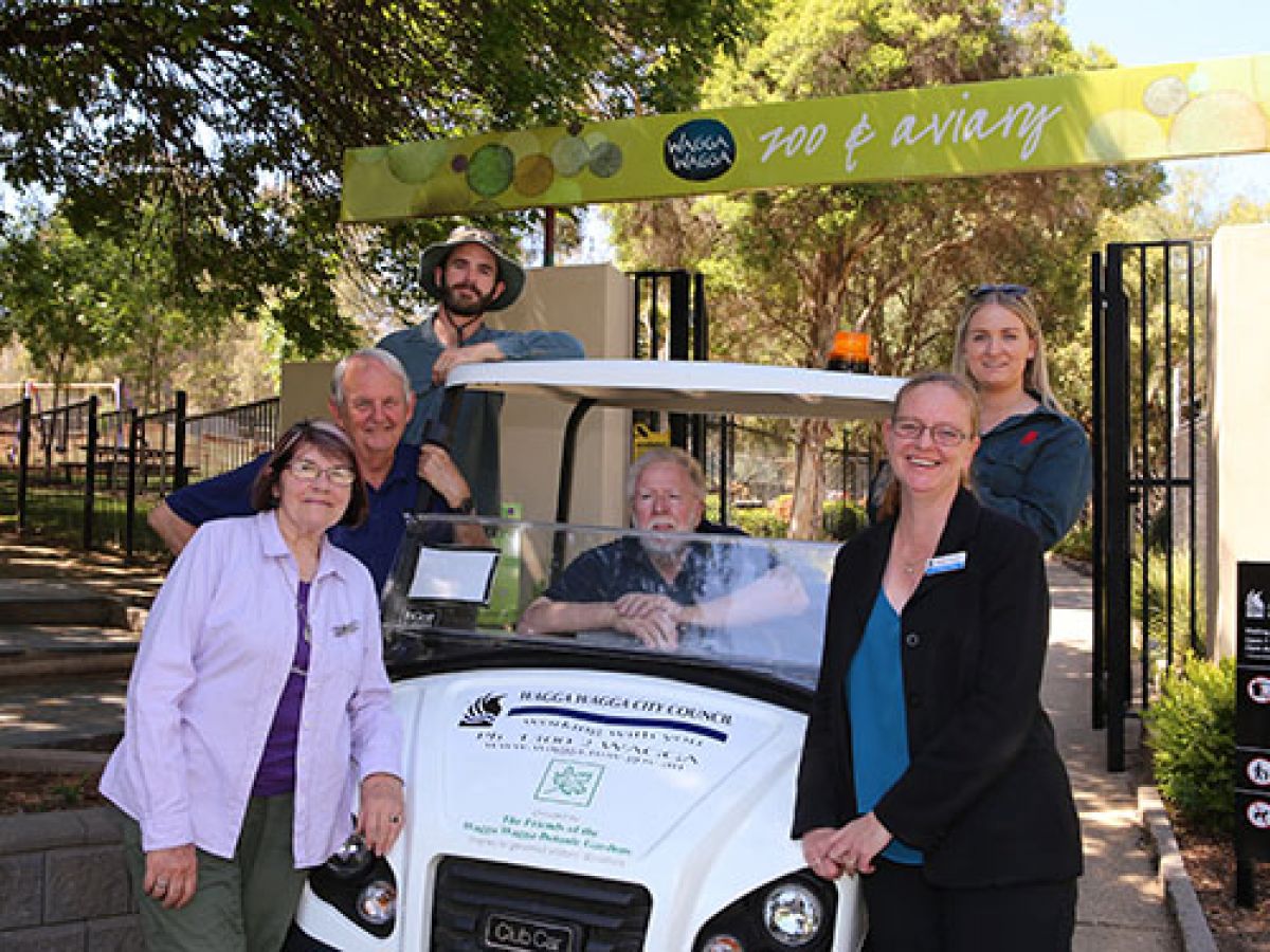 ZOOM ZOOM: The Friends of the Wagga Wagga Botanic Gardens representatives Irene (front left) and Bill Toal (centre) handed over the new electric utility vehicle to Wagga Wagga City Council’s Mayor Cr Greg Conkey OAM, Louis Reid, Kira McBeath and Director Corporate Services Natalie Te Pohe this week.