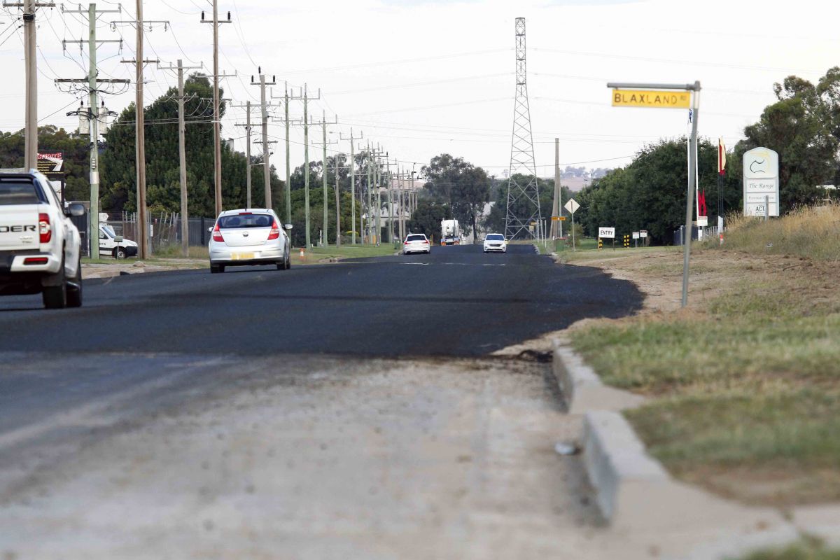 Rehabilitated and resealed Copland Street, with Blaxland St sign in foreground