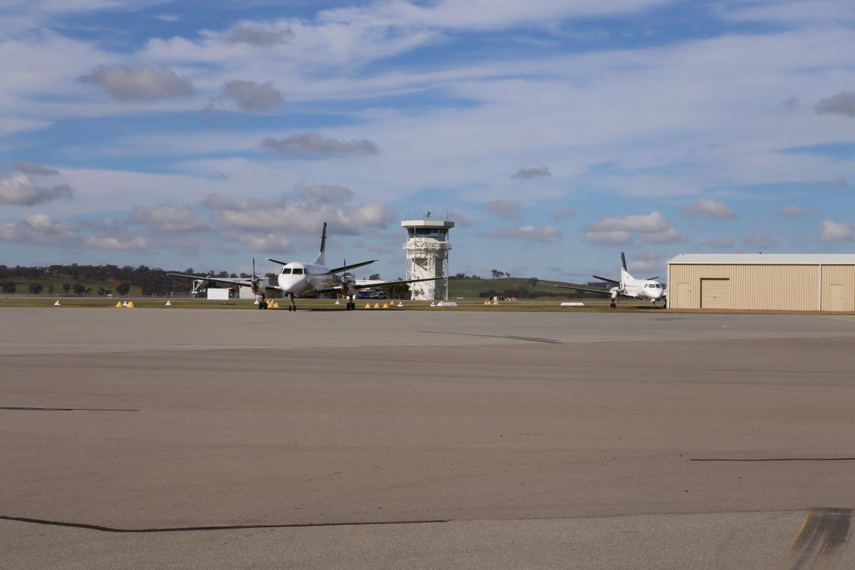 Commercial twin turbo prop aeroplane on tarmac, Wagga airport