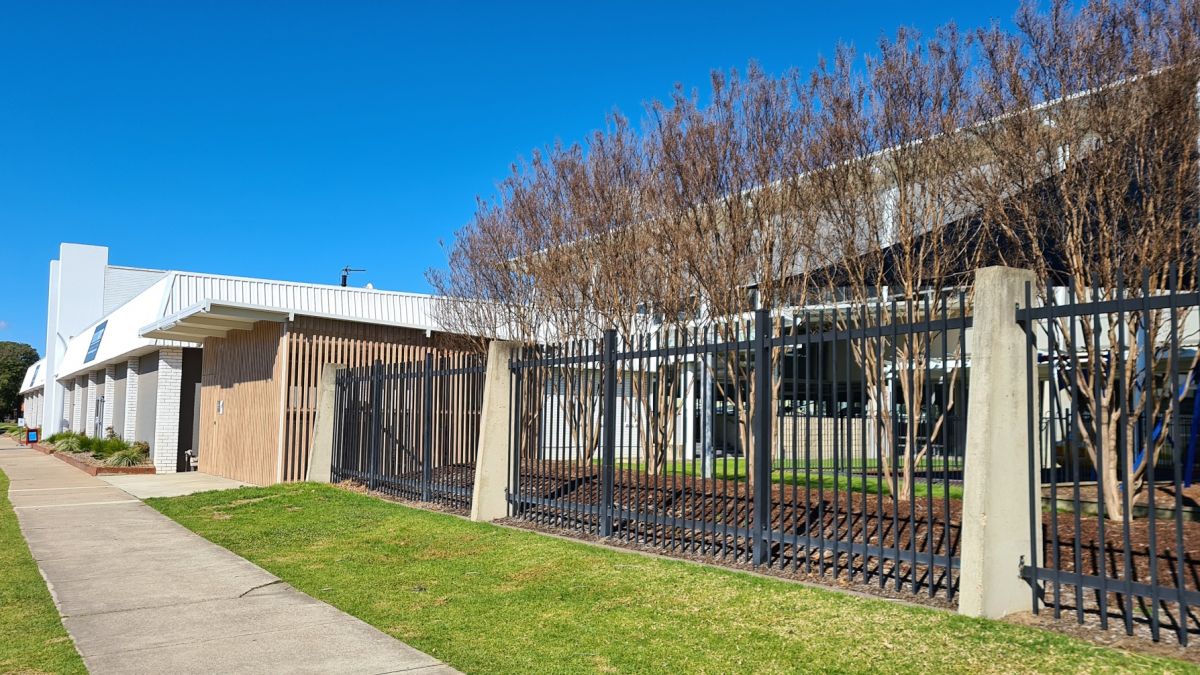 Exterior of end of trip facility next to indoor pool complex