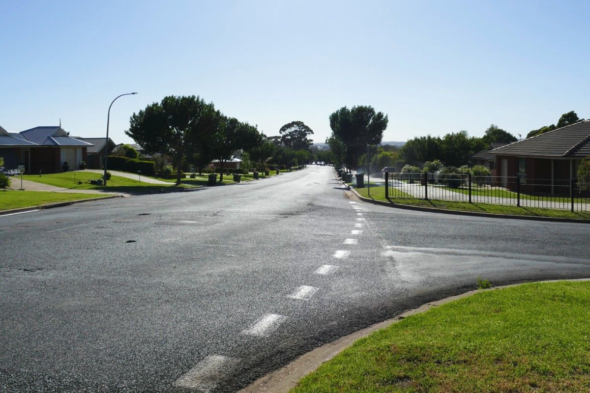 Fay Avenue, a suburban street lined by houses.