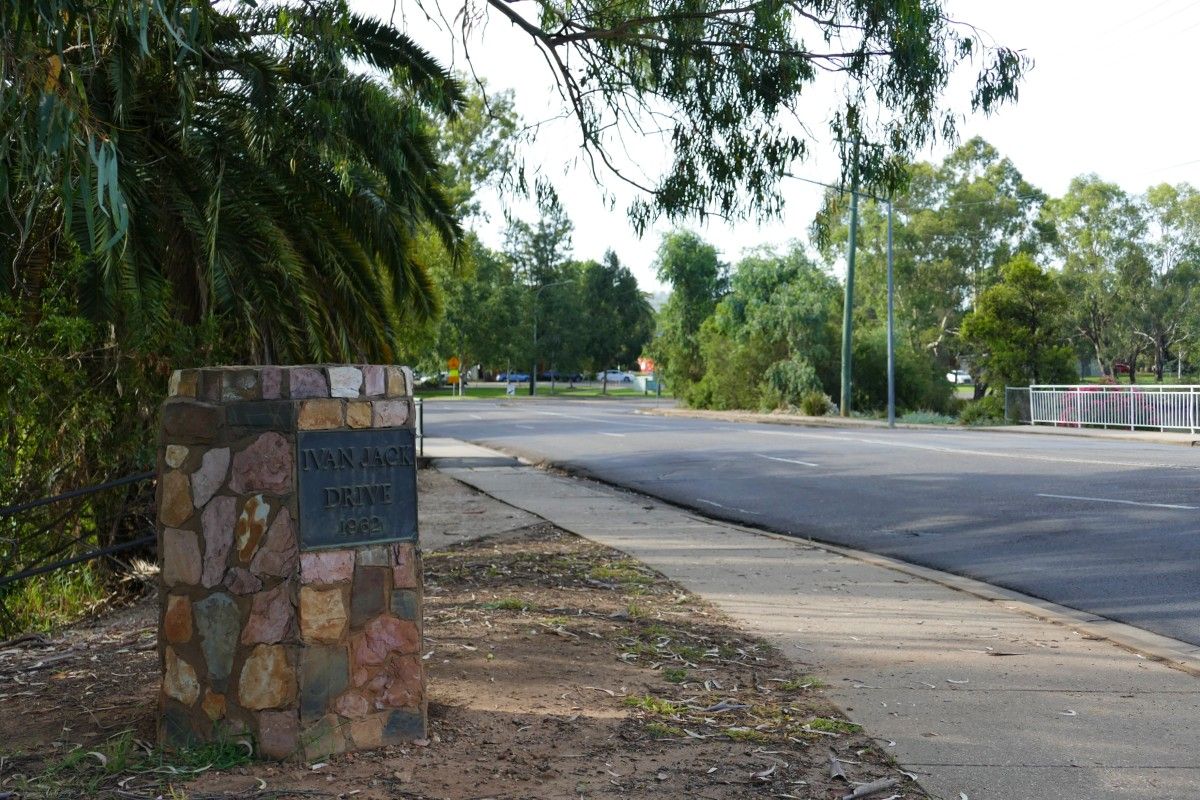 Brick road sign for Ivan Jack Bridge, with the date 1962 on the sign.